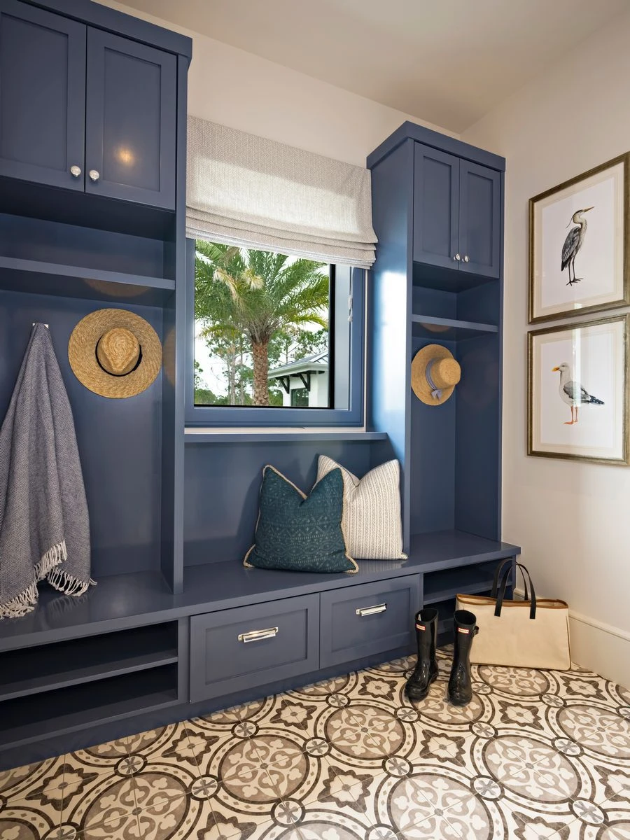 Jupiter Farms — mudroom with navy bench and decorative tile floor