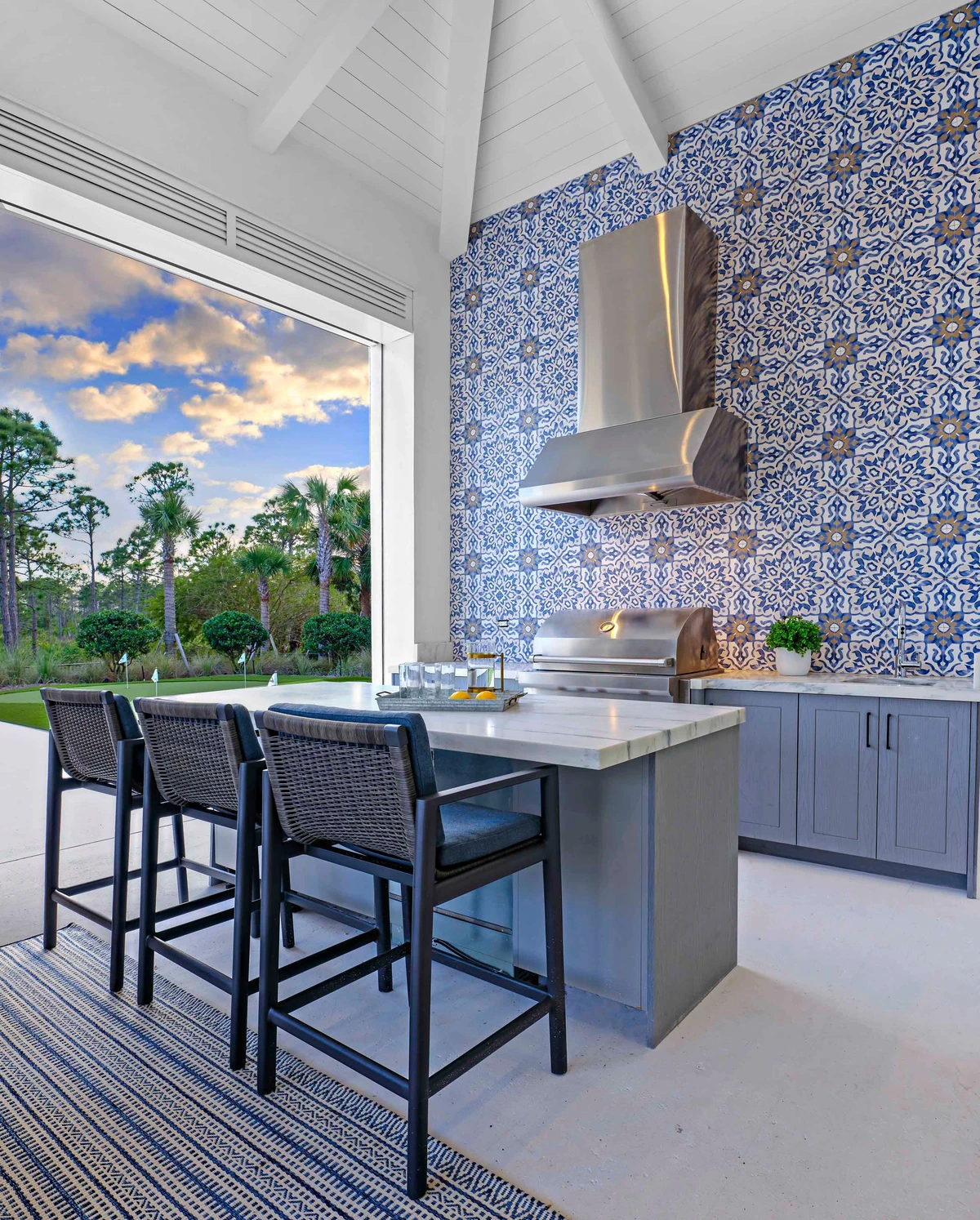 Jupiter Farms — outdoor kitchen with Moroccan tile wall