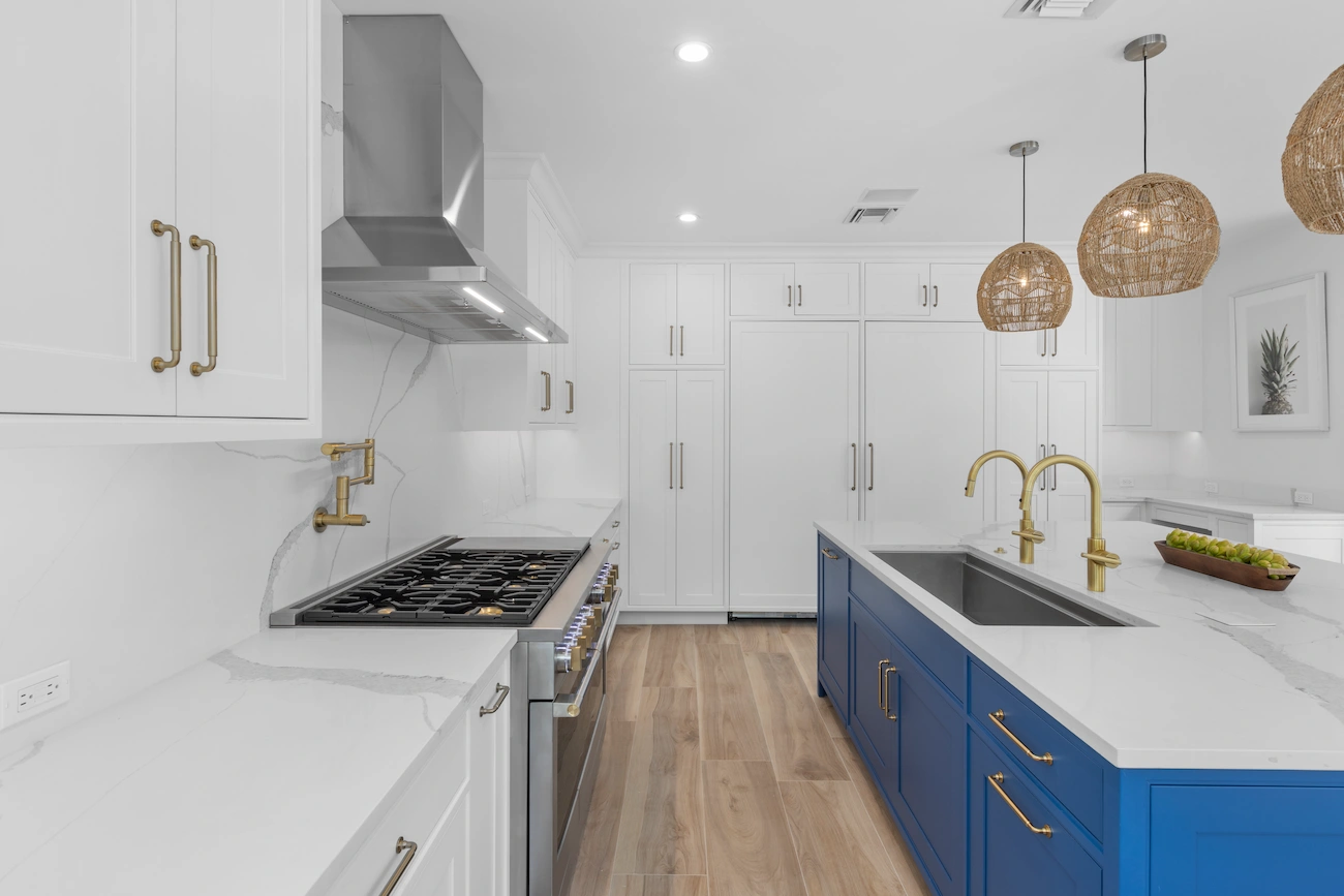 High end kitchen remodel by Nakamura Contractors — custom cabinetry, marble countertops, and premium finishes in South Florida