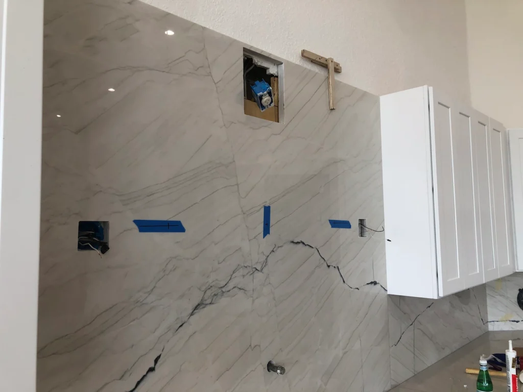 Kitchen floor contractors in South Florida — Nakamura Contractors installs hardwood, tile, and LVP flooring in residential and commercial kitchens